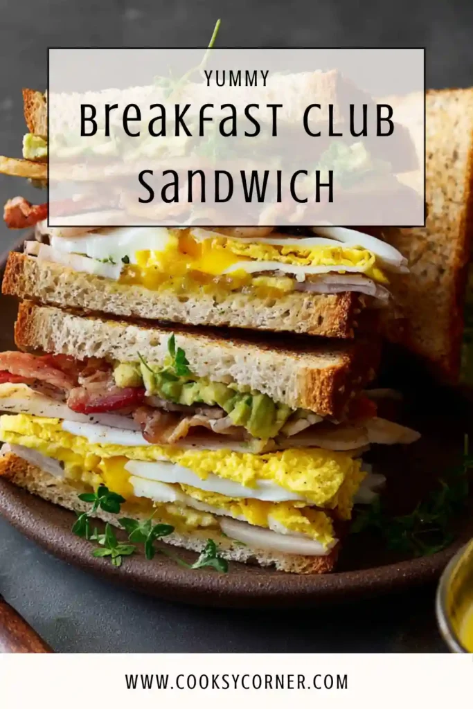 Overhead view of a stacked breakfast sandwich with scrambled eggs, cheesy ground meat, and cowboy butter on a rustic serving board.