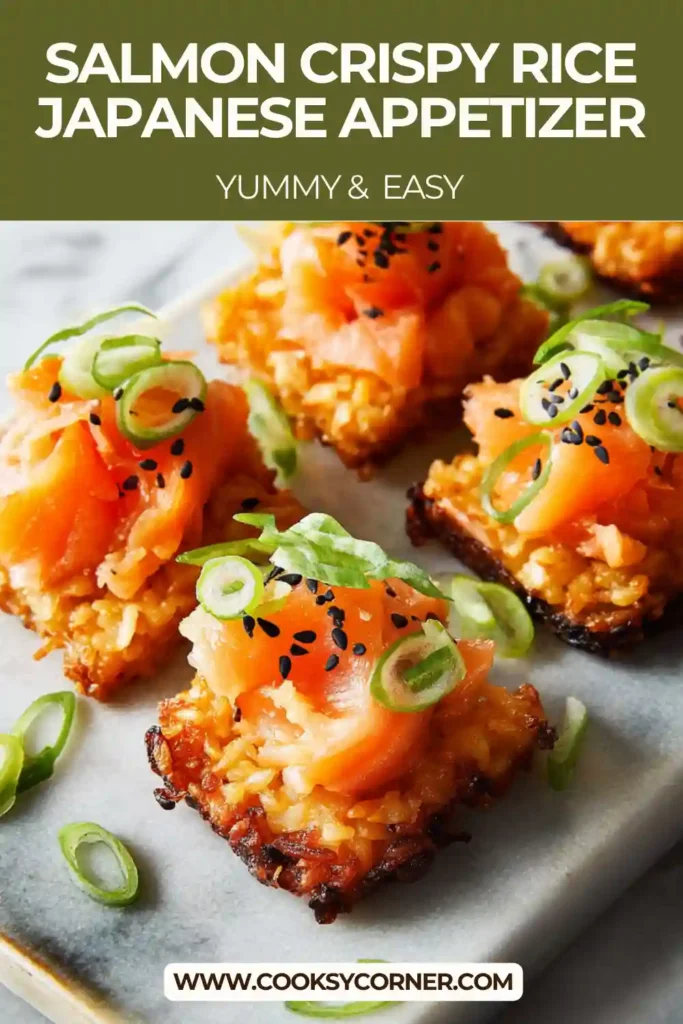 Japanese-style Salmon Crispy Rice arranged on a plate with avocado and sesame seeds. Crunchy rice contrasts with creamy salmon.