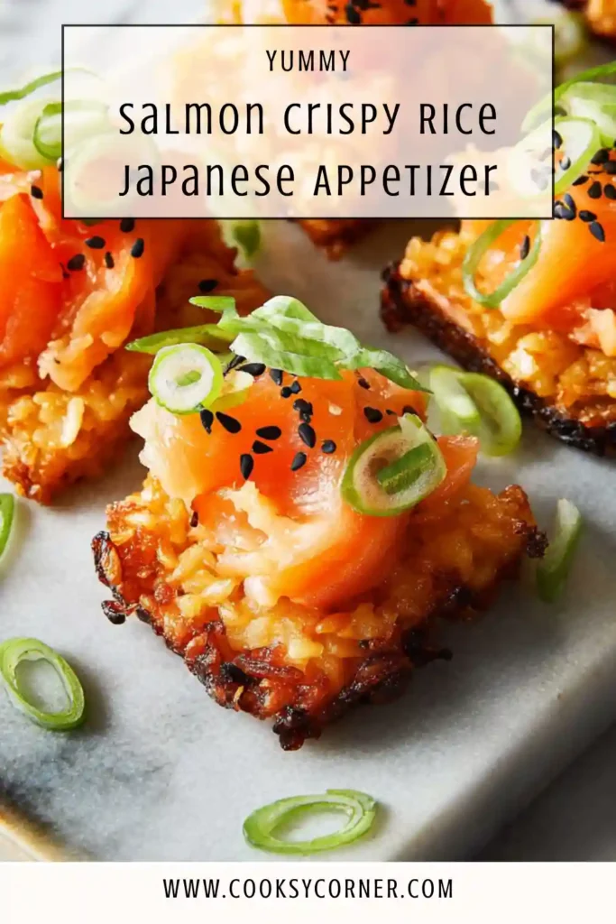 Salmon Crispy Rice topped with spicy salmon, avocado, and sesame seeds served as a Japanese appetizer. The rice is golden and crispy with a creamy salmon topping.