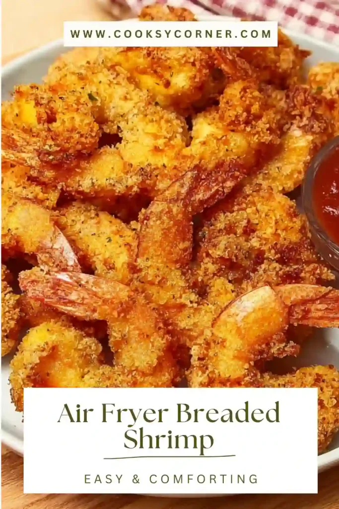 Freshly cooked Air Fryer Breaded Shrimp served on a plate with dipping sauce.