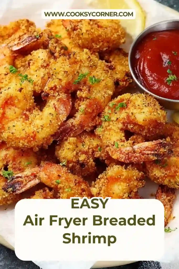 Air Fryer Breaded Shrimp arranged in a basket with a golden crispy coating and visible seasoning texture.