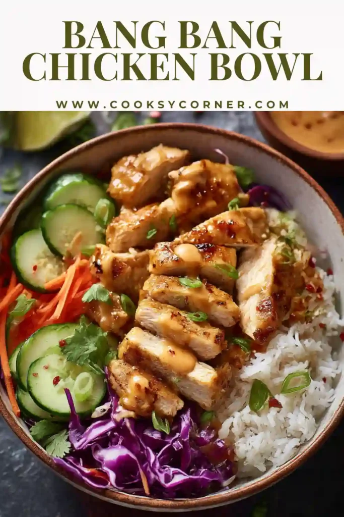 Crispy bang bang chicken served over rice with sauce.