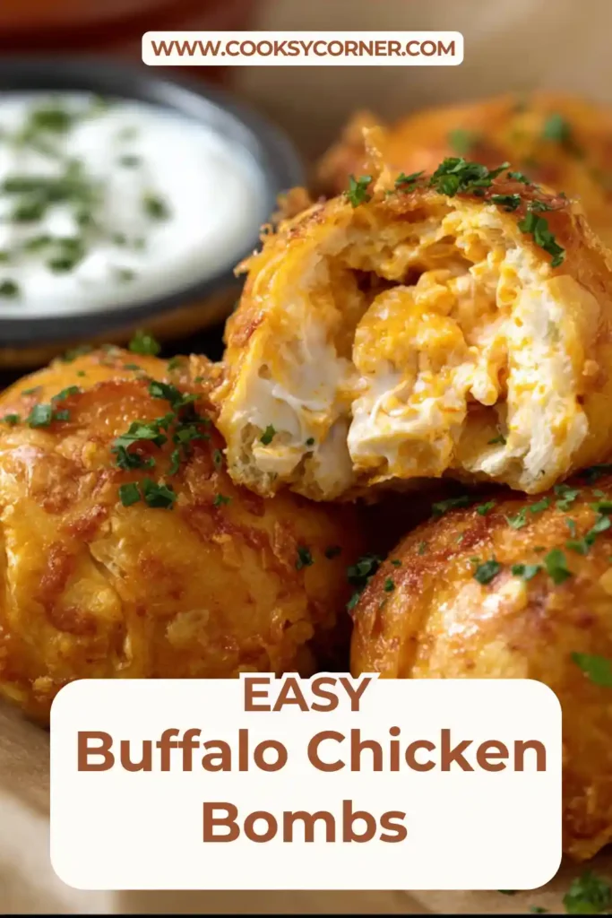 Homemade Buffalo Chicken Bombs brushed with buffalo sauce and garnished with green onions. Crispy outside and creamy inside.