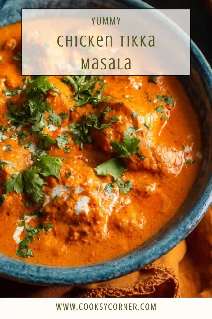 Chicken tikka masala served in a bowl with creamy tomato sauce.
