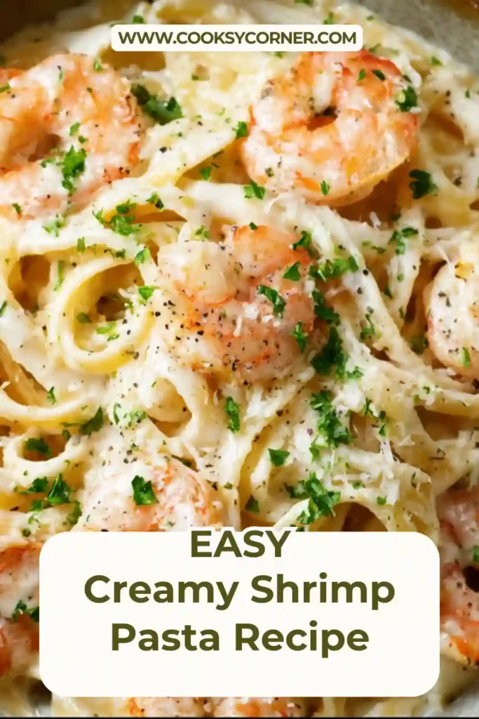 Close-up of creamy shrimp pasta garnished with parsley.