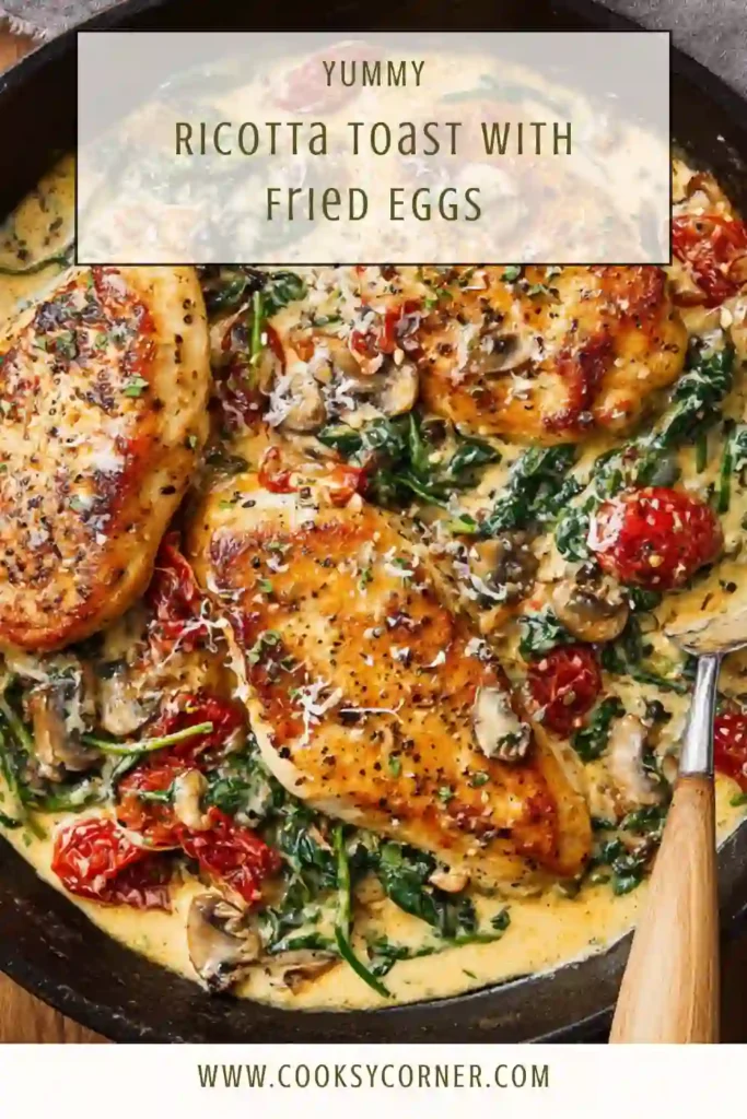 Creamy chicken with spinach and tomatoes in a skillet.