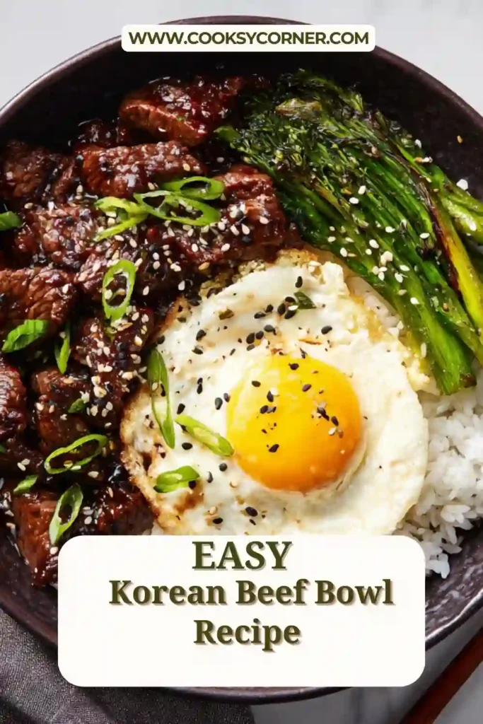 A close-up of Korean Beef Bowl featuring sweet and savory ground beef with scallions and fresh vegetable toppings.