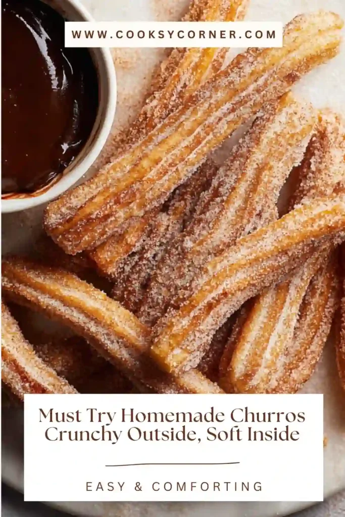 Homemade churros coated in cinnamon sugar served with chocolate dipping sauce, showing a crunchy exterior and soft interior.