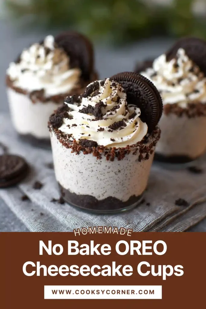 No bake OREO cheesecake cups topped with whipped cream and cookie crumbs.