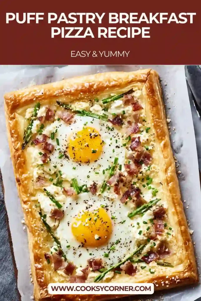 Sliced Puff Pastry Breakfast Pizza served warm on a baking sheet. Perfect for family-style brunch gatherings.