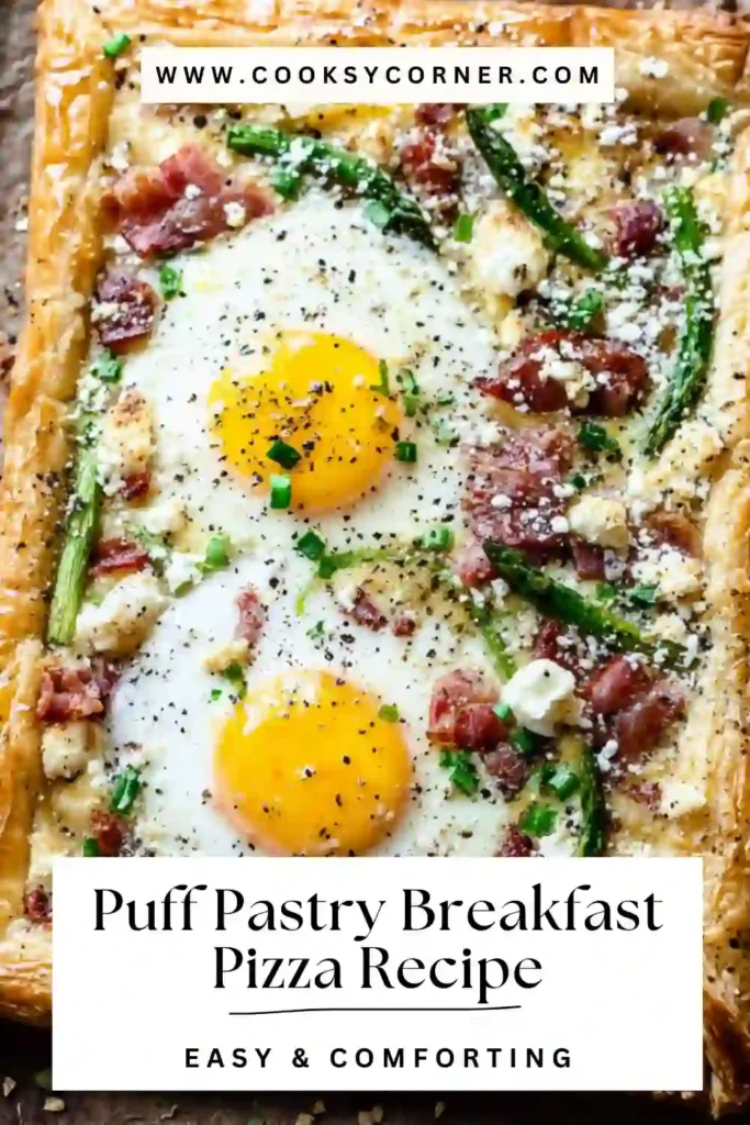 Close-up of Puff Pastry Breakfast Pizza topped with eggs, cheddar cheese, and vegetables. A savory and easy brunch recipe.