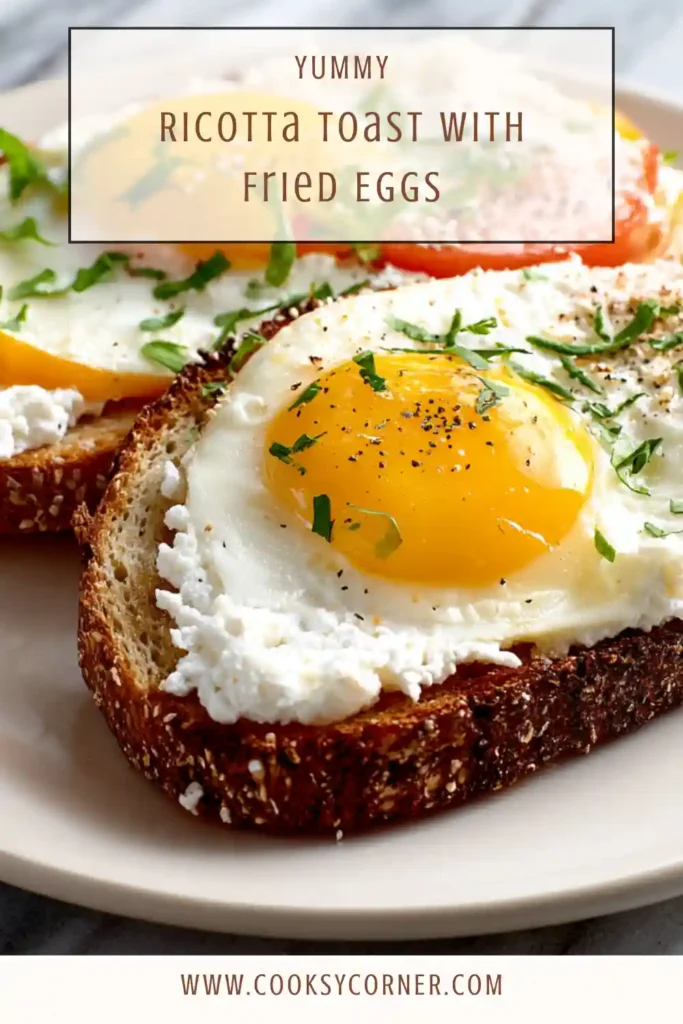 Breakfast ricotta toast with fried egg and fresh basil garnish.