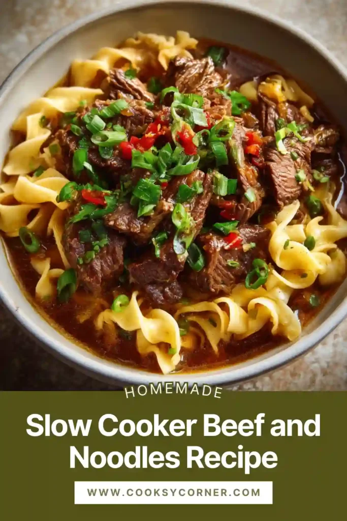 Close-up of Slow Cooker Beef and Noodles showing juicy beef, soft noodles, and herbs in a savory sauce. A classic comfort food recipe.