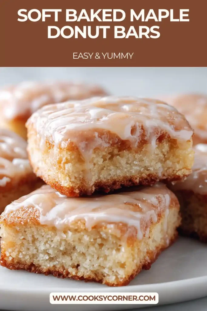 Freshly baked Soft Baked Maple Donut Bars cooling in a pan with maple glaze poured over the top. These bars have a tender crumb and warm maple flavor.