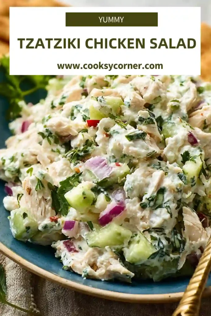 Greek chicken salad with cucumber, dill, and feta in a bowl.