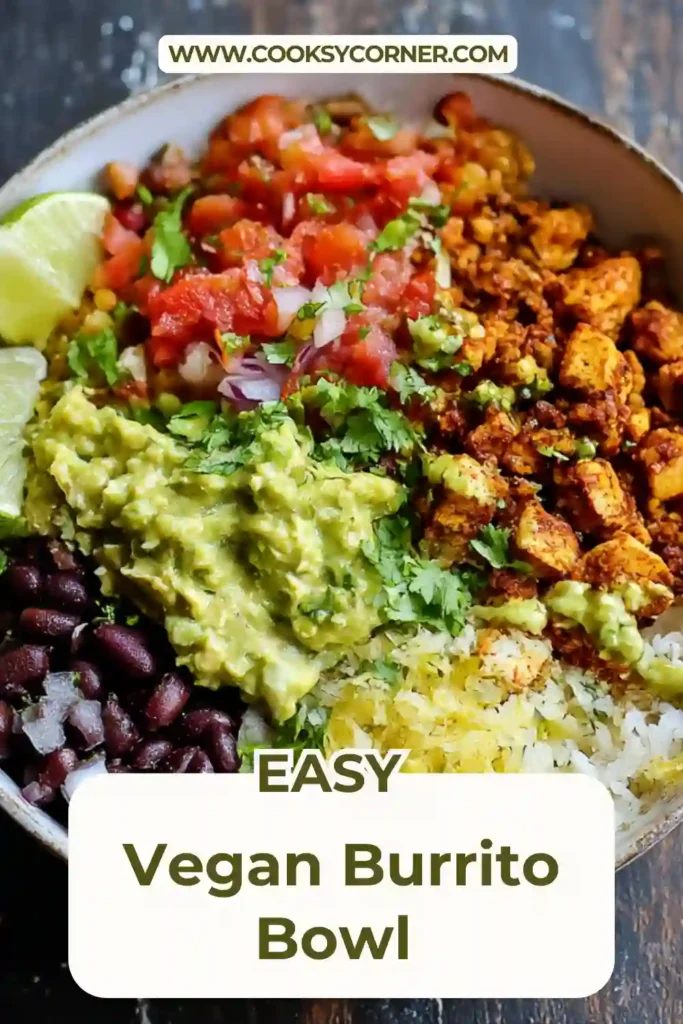Chipotle-inspired Vegan Burrito Bowl layered with rice, beans, peppers, onions, and guacamole.