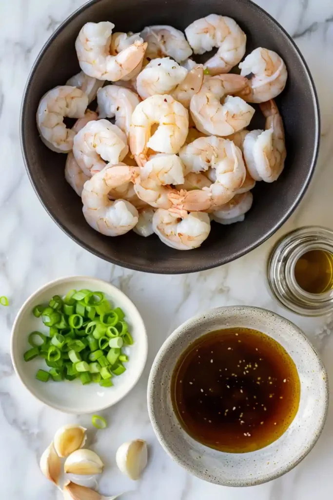 Skillet honey garlic shrimp served with brown rice and vegetables. This easy shrimp recipe is quick and satisfying.