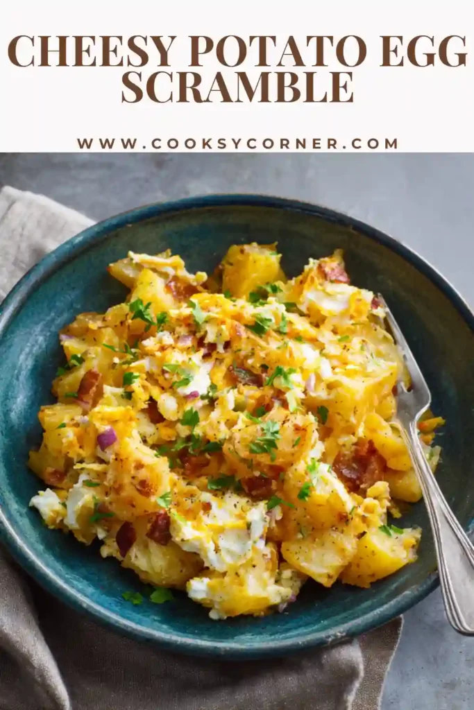 Cheesy potato egg scramble with crispy potatoes, beef, and melted cheese.