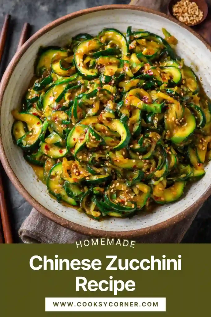 Close-up of spicy garlic zucchini noodles mixed with sesame oil and chili oil, showcasing vibrant color and fresh ingredients from a Chinese Zucchini Recipe.