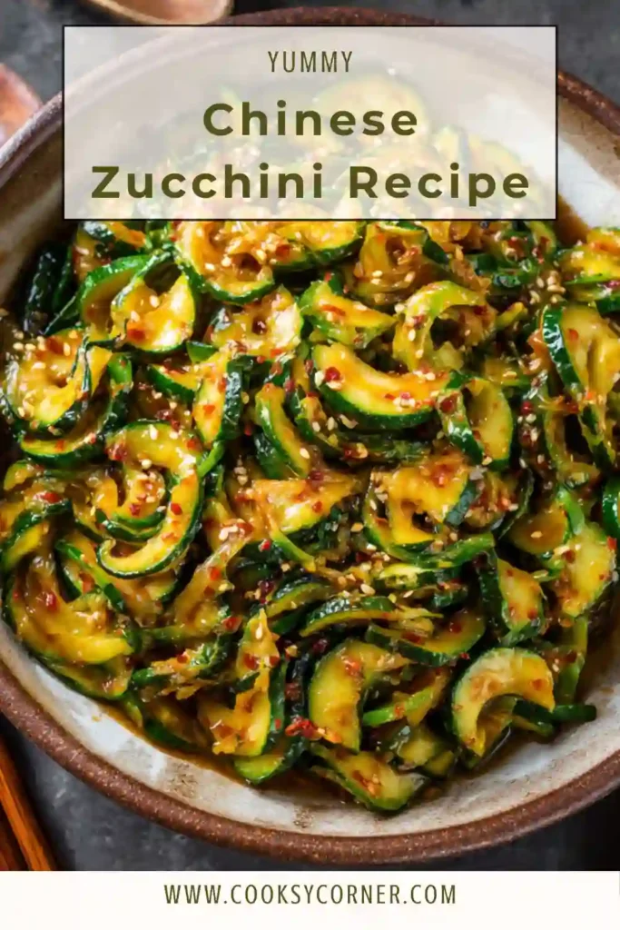 Chinese Zucchini Recipe with spiralized zucchini tossed in spicy garlic sesame sauce, showing fresh texture and glossy coating. The dish highlights a healthy Chinese zucchini side served in a bowl.