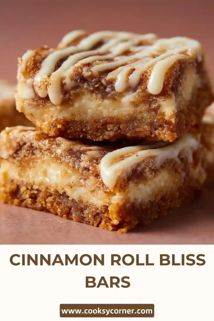 Homemade Cinnamon Roll Bliss Bars arranged on a serving tray with visible cinnamon pattern and glossy glaze topping.
