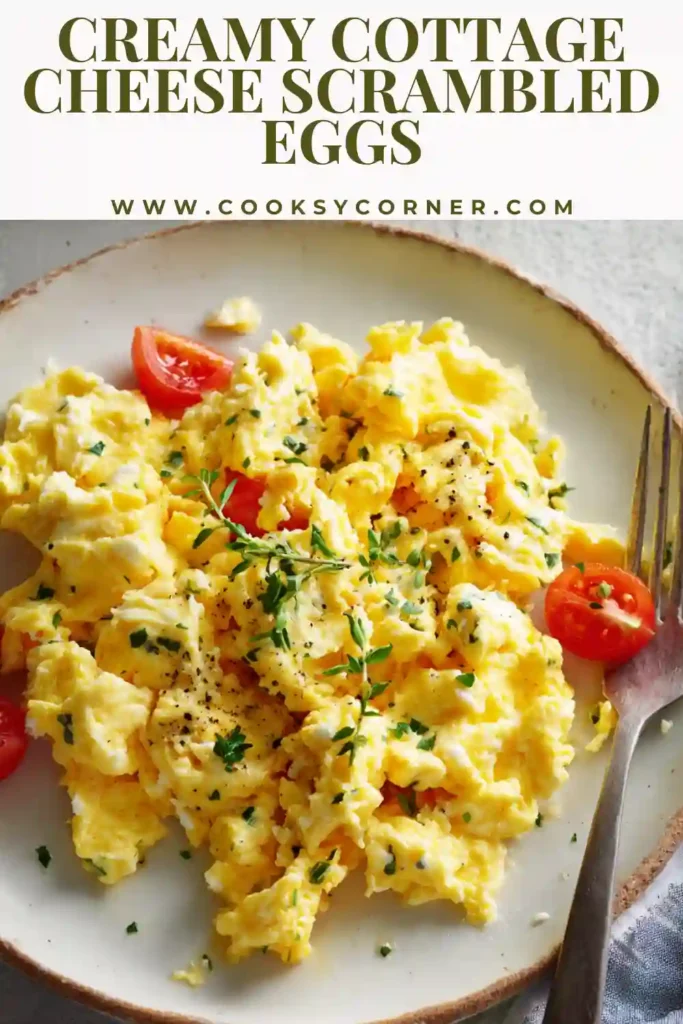 Creamy cottage cheese scrambled eggs cooked softly in a skillet.