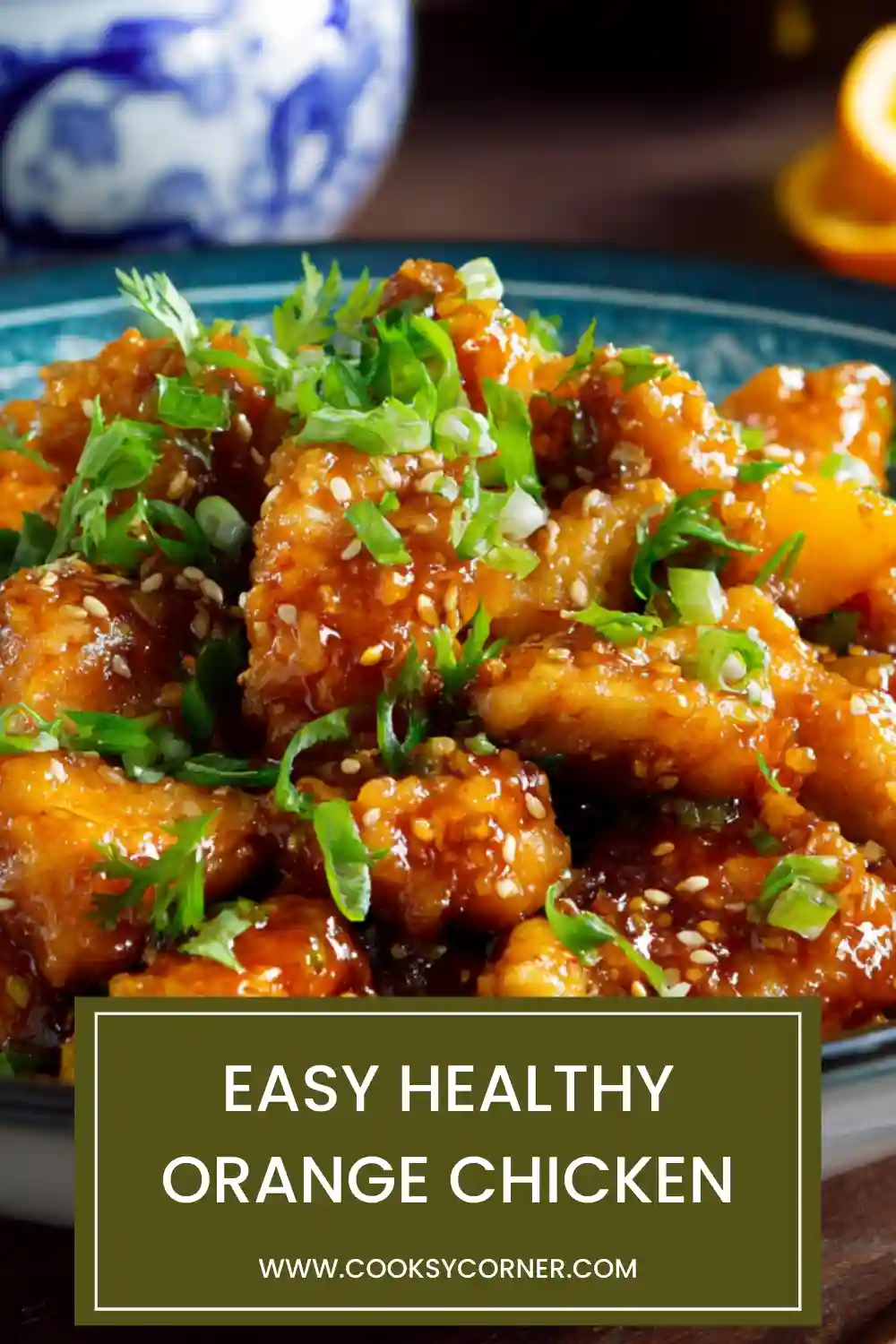 Easy healthy orange chicken coated in glossy citrus sauce and served with rice.