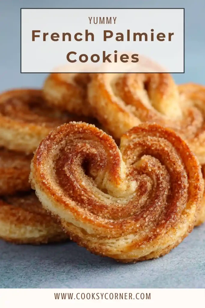 Close-up of French Palmier Cookies showing flaky layers and glossy caramelized sugar coating. Easy cinnamon palmiers made from puff pastry.