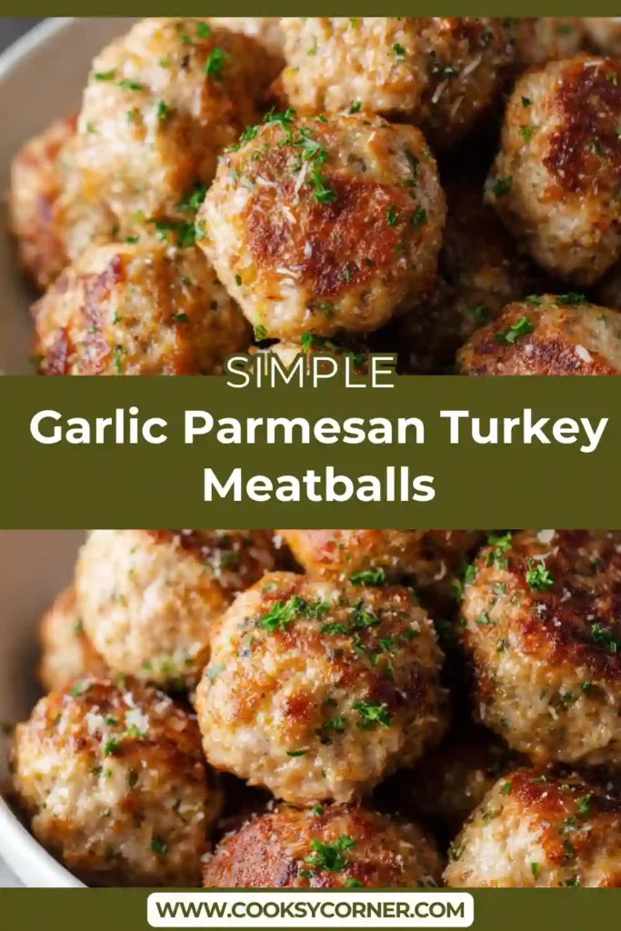 A tray of baked Garlic Parmesan Turkey Meatballs fresh from the oven, golden brown and garnished with parsley. These juicy baked turkey meatballs are evenly sized and full of garlic and parmesan flavor.