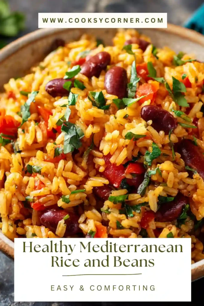 Healthy Mediterranean Rice and Beans served in a bowl with chickpeas, spinach, and fresh herbs.