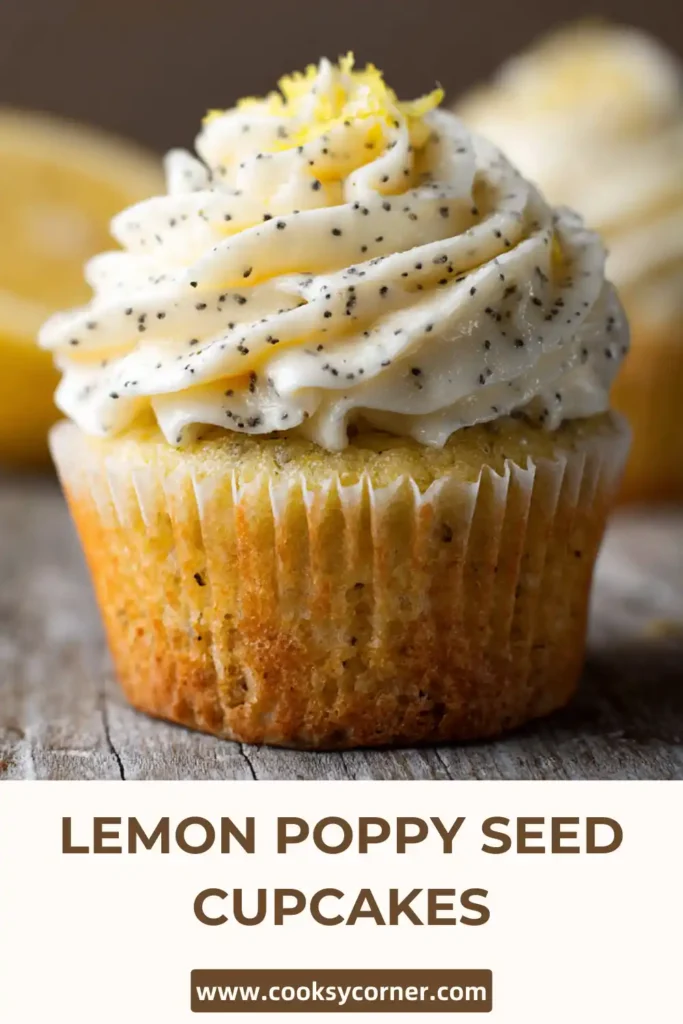 Homemade citrus cupcakes with lemon zest garnish and poppy seed texture.