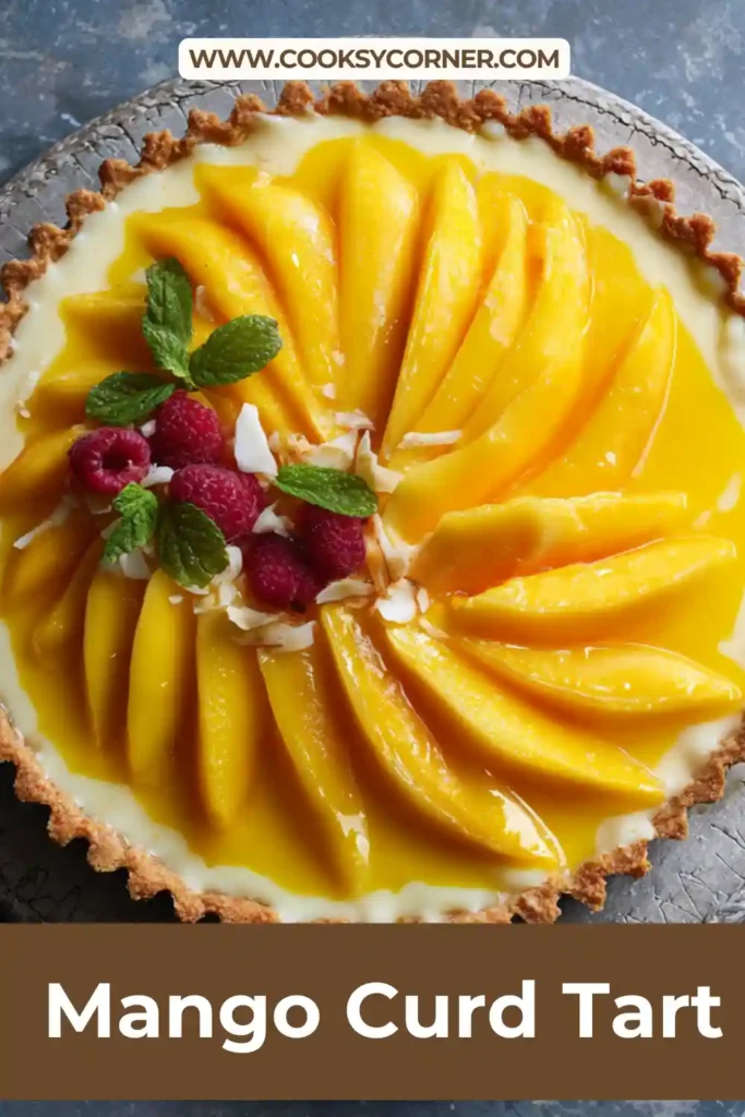 Tropical mango tart with fresh fruit garnish on top.