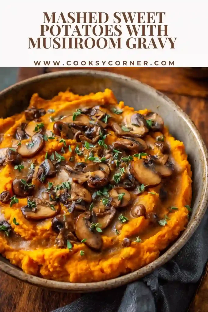 Mashed sweet potatoes topped with vegan mushroom gravy and fresh herbs.