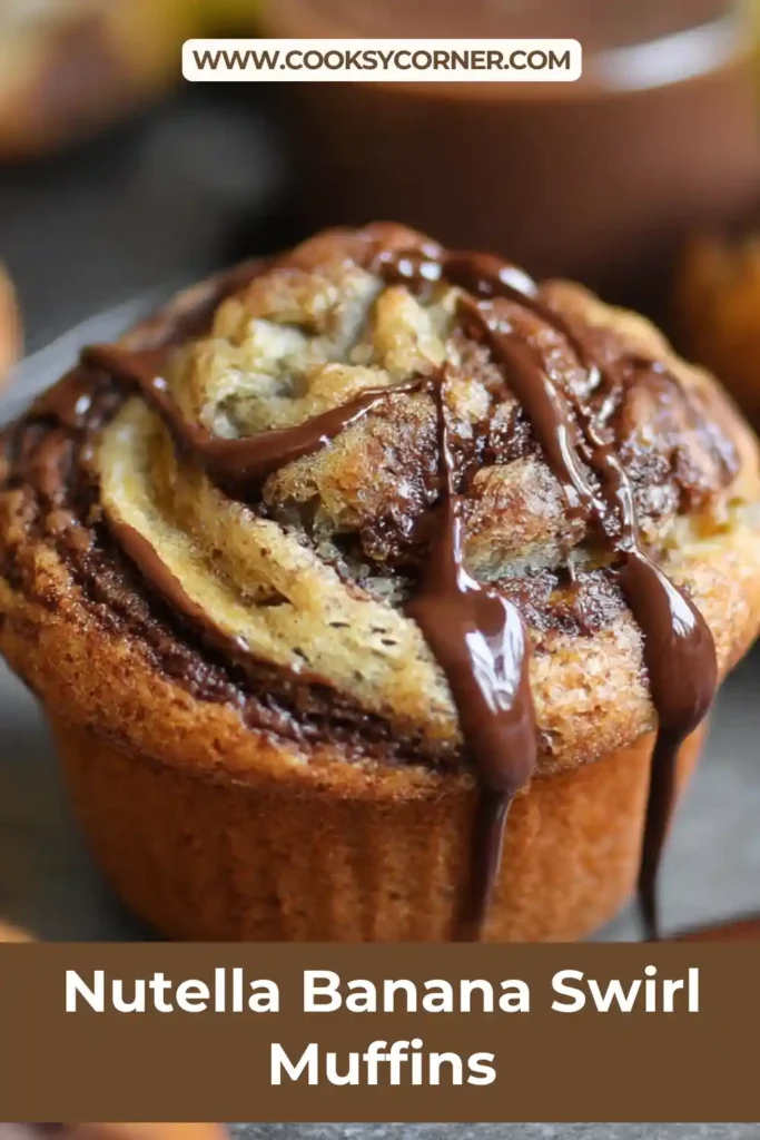 Freshly baked Nutella Banana Swirl Muffins cooling on wire rack.