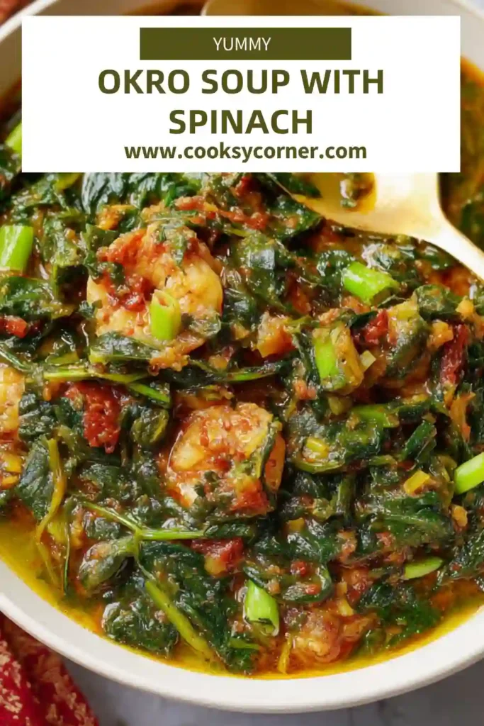 Nigerian okra soup with palm oil, dry fish, and fresh spinach leaves.