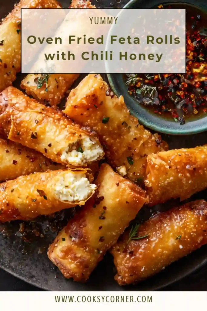 Crispy baked feta phyllo rolls with chili honey and fresh dill garnish.