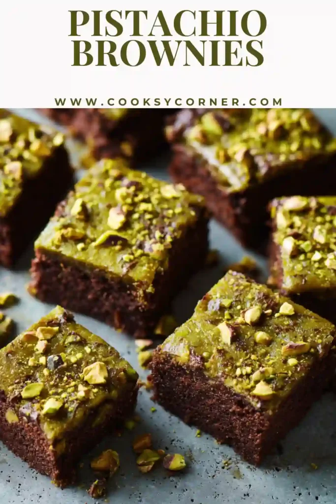 Fudgy chocolate pistachio brownies sliced into squares.