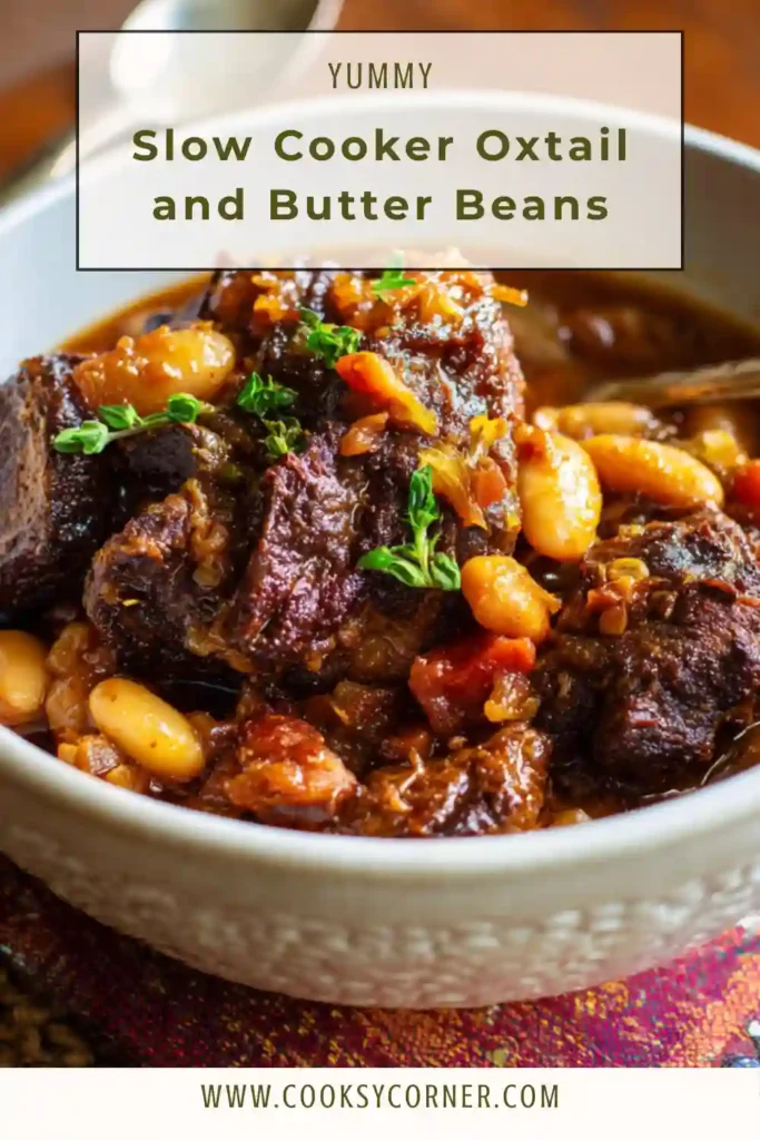 Slow Cooker Oxtail and Butter Beans served in a bowl with rich brown gravy and tender meat over rice.