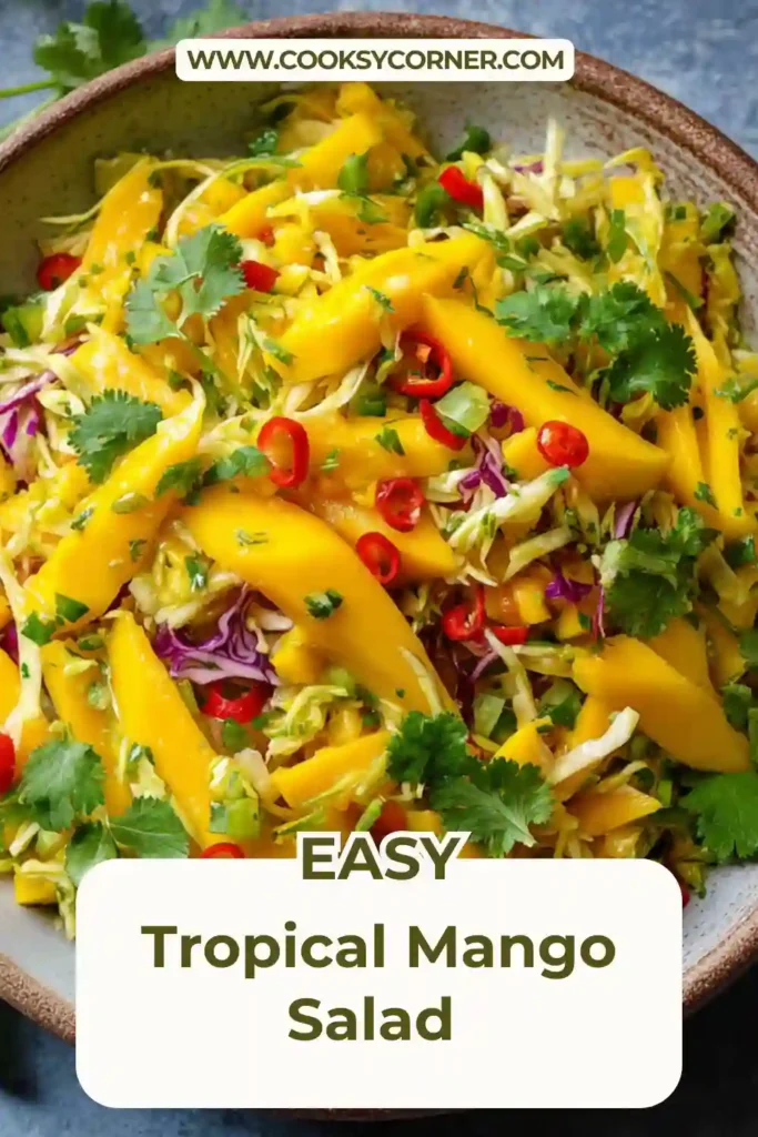 Homemade Tropical Mango Salad topped with chili slices and cilantro. A refreshing and healthy summer dish.