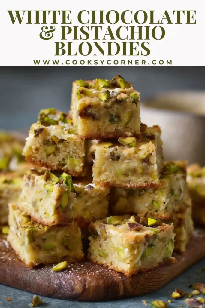 Chewy pistachio blondies sliced into squares on parchment paper.