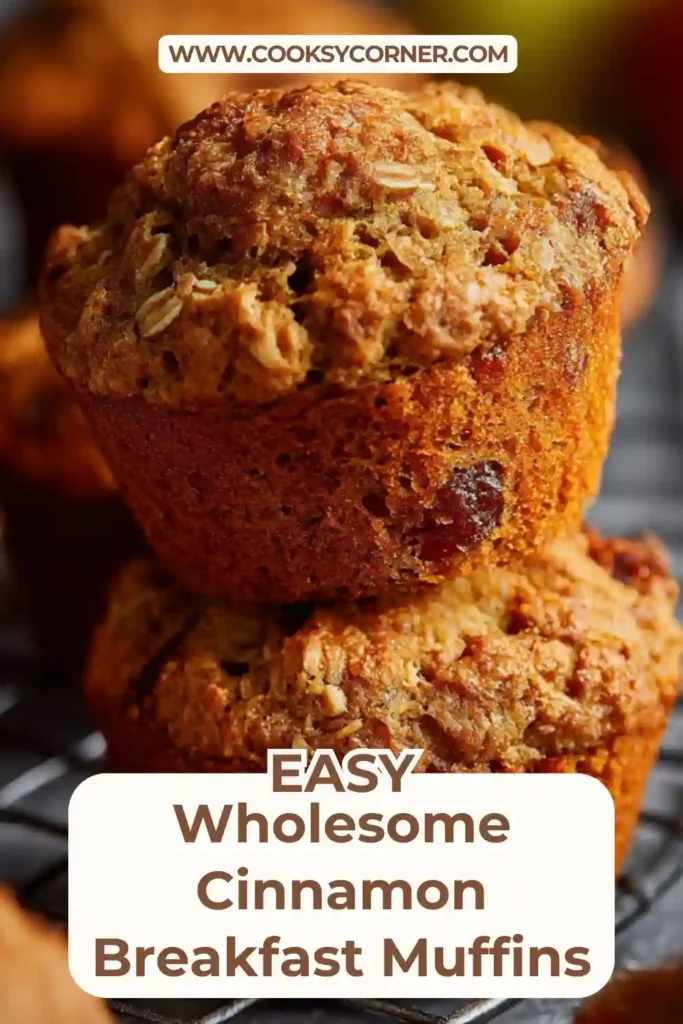 Whole wheat cinnamon muffins packed with fruit and nuts for a nourishing breakfast.
