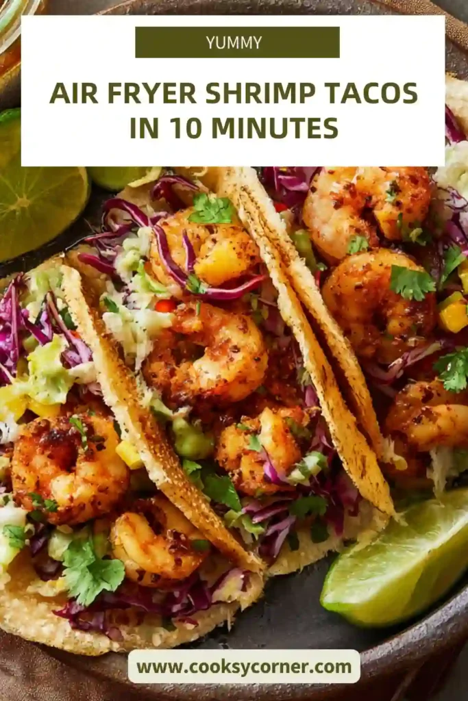 Homemade shrimp tacos with crispy air fryer shrimp, creamy guacamole, and soft tortillas arranged beautifully.