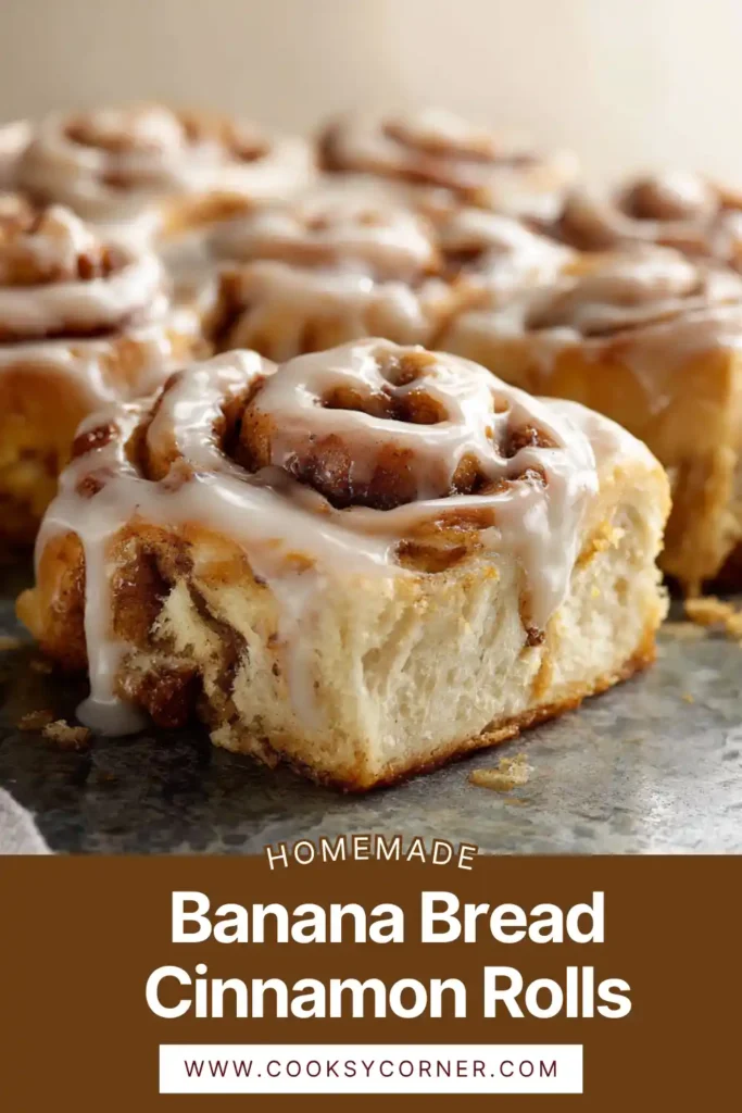Close-up of soft cinnamon rolls with banana flavor and creamy topping.