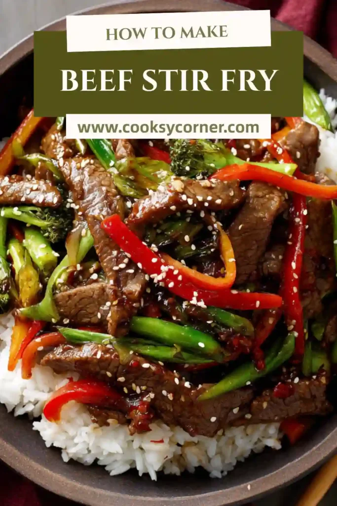Asian-style beef stir fry with vegetables served in a bowl over steamed rice.