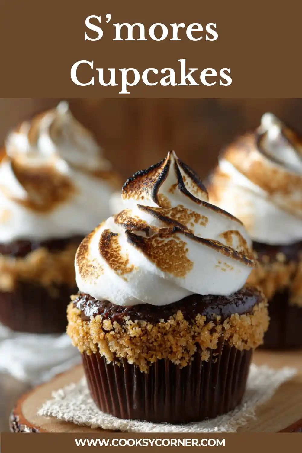 Layered Biscoff banana pudding with whipped cream, sliced bananas, and Lotus Biscoff cookies in a glass dish.