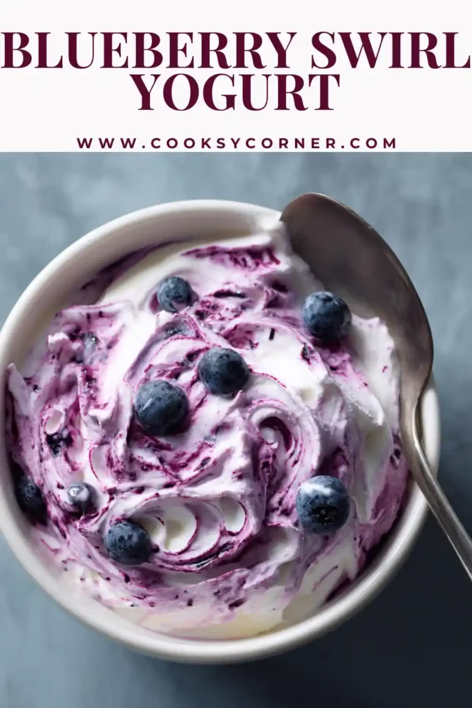 Fresh blueberry yogurt swirl sauce ready to add to breakfast yogurt.