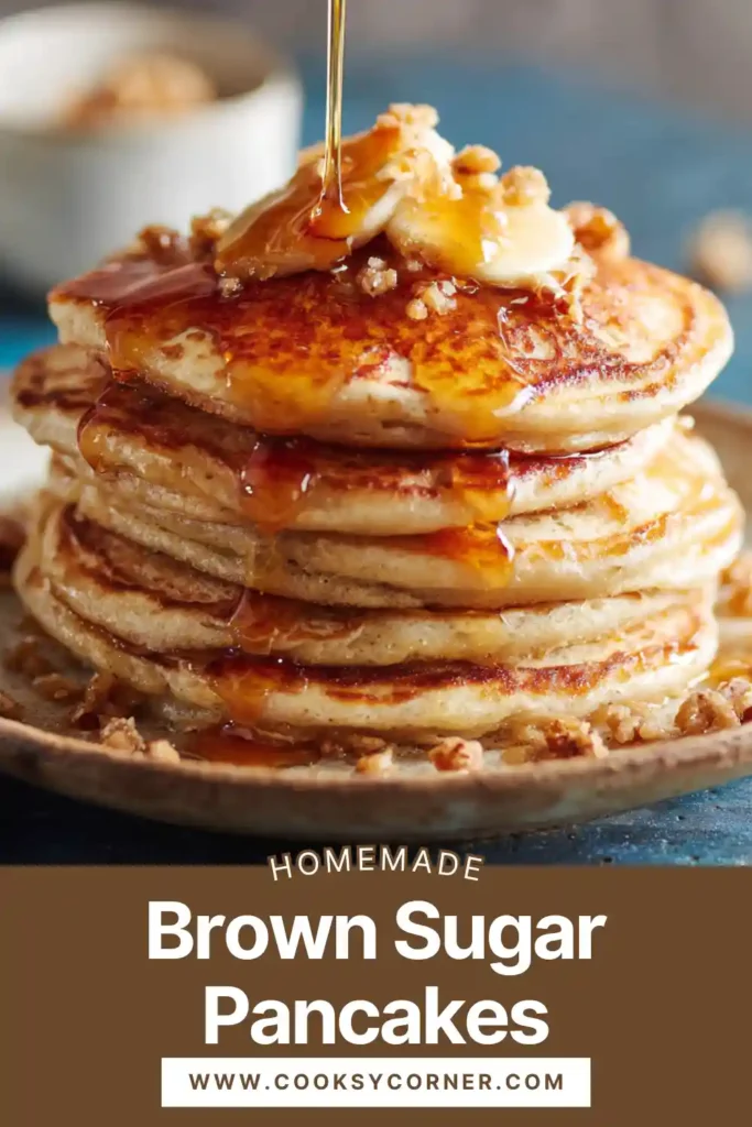 A stack of fluffy brown sugar pancakes topped with maple syrup and butter on a white plate. The pancakes are golden brown with soft, airy layers visible.