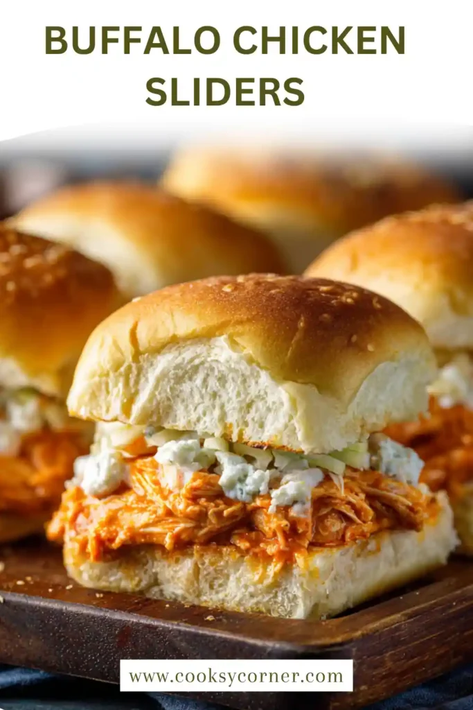 Baked chicken sliders with golden tops and gooey melted cheese inside.