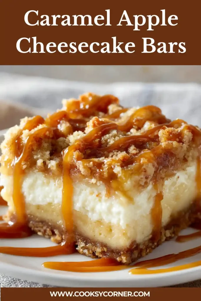 Close-up of layered apple cheesecake bars with creamy filling and caramel sauce drizzle.