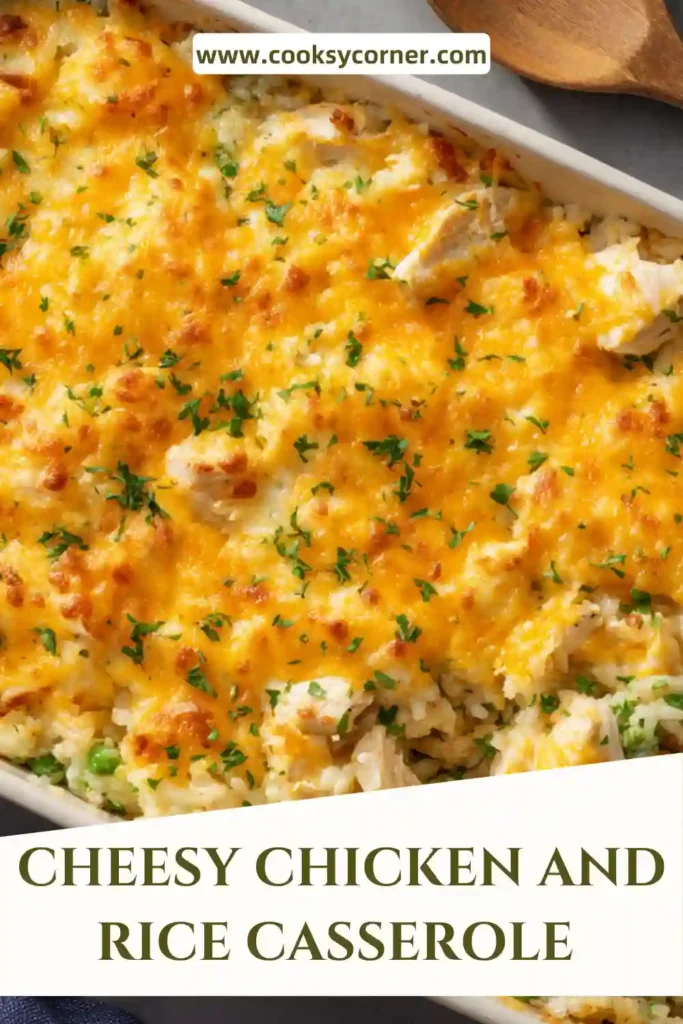 Close-up of cheesy chicken rice casserole with tender chicken pieces and fluffy rice.